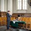 Webinars over online vieren Foto: Ds. Pim Brouwer in de Grote Kerk in Maassluis. Fotograaf: Theo van Pelt. www.maassluisopafstand.com